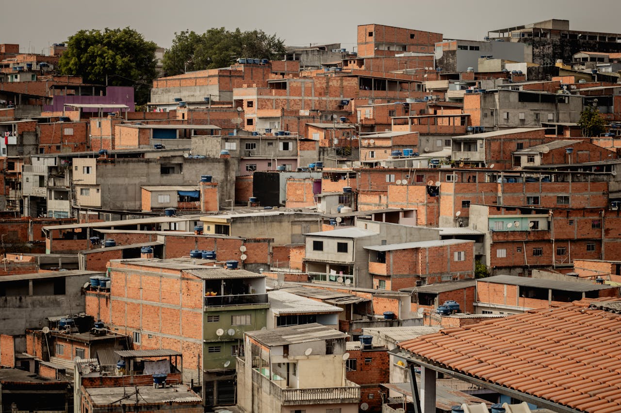 services-02 Colorful rooftops in a sprawling São Paulo favela, Brazil.